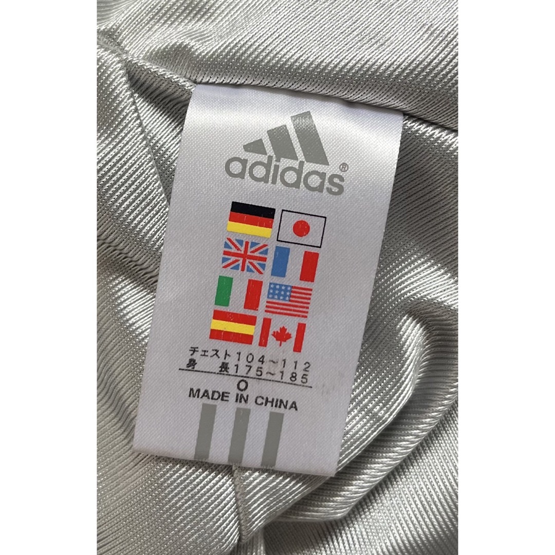 adidas(アディダス)のadidas アディダス ゴルフ 万国旗タグ 半袖ハーフzipジャケット  スポーツ/アウトドアのゴルフ(ウエア)の商品写真