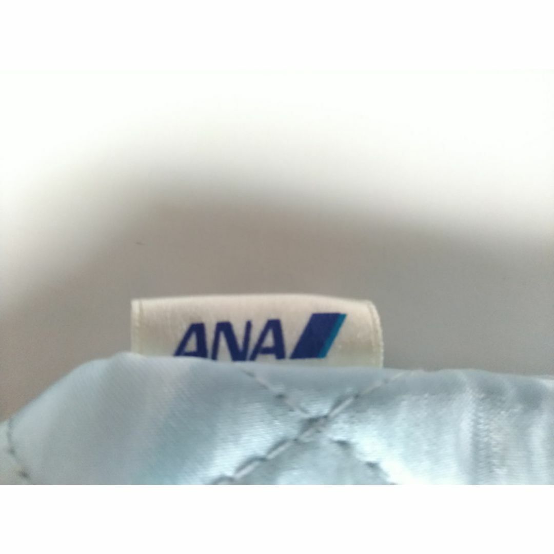 ANA(全日本空輸)(エーエヌエー(ゼンニッポンクウユ))のANAフライングホヌのフェイスタオルと巾着袋 エンタメ/ホビーのコレクション(ノベルティグッズ)の商品写真