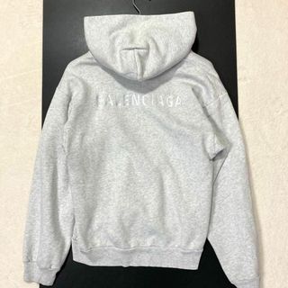 バレンシアガ(Balenciaga)のバレンシアガ バックロゴ 刺繍 背面 ワンポイント プルオーバーパーカー グレー(パーカー)