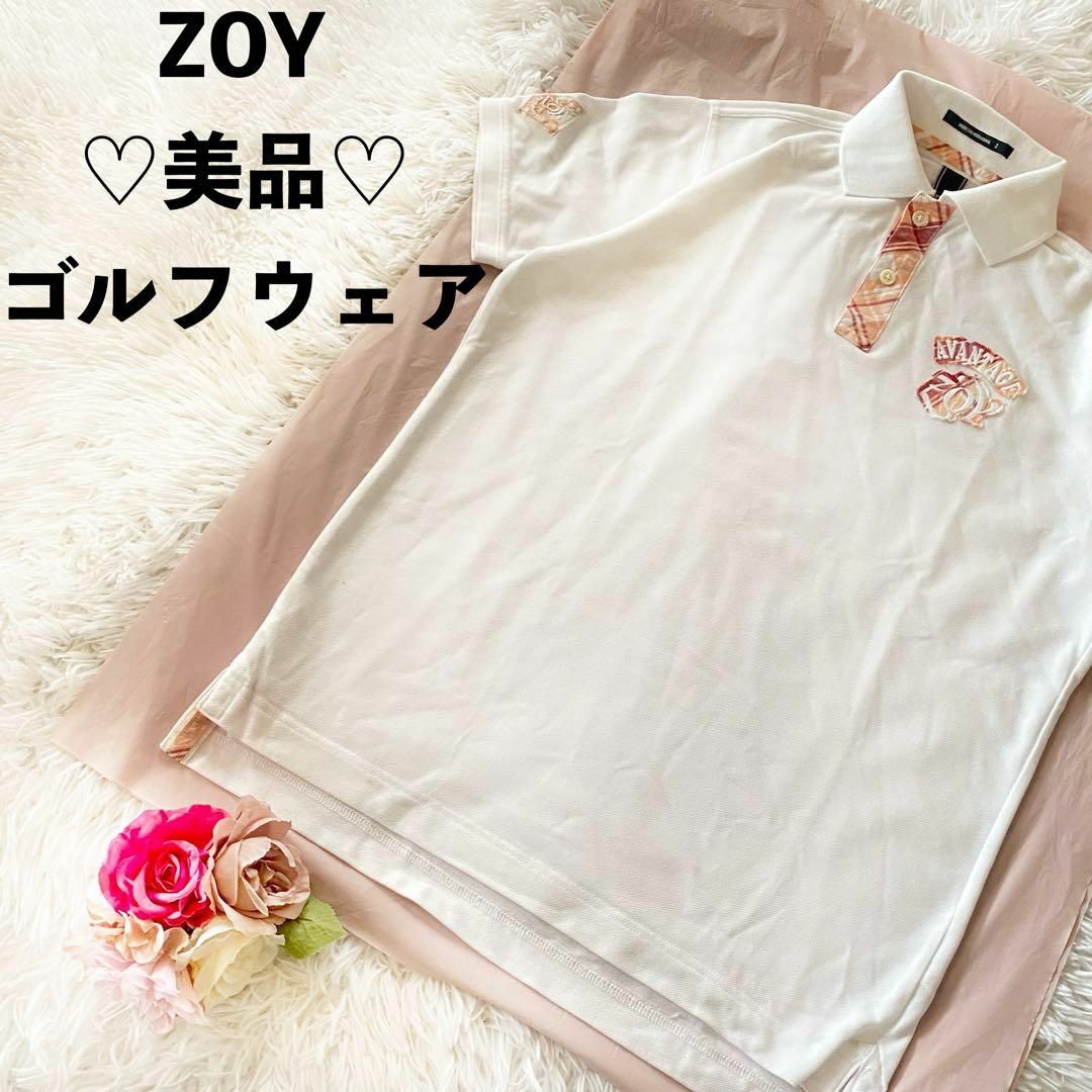 ZOY(ゾーイ)のゾーイ　ゴルフウェア　メンズ　ポロシャツ　白系　ワッペン スポーツ/アウトドアのゴルフ(ウエア)の商品写真