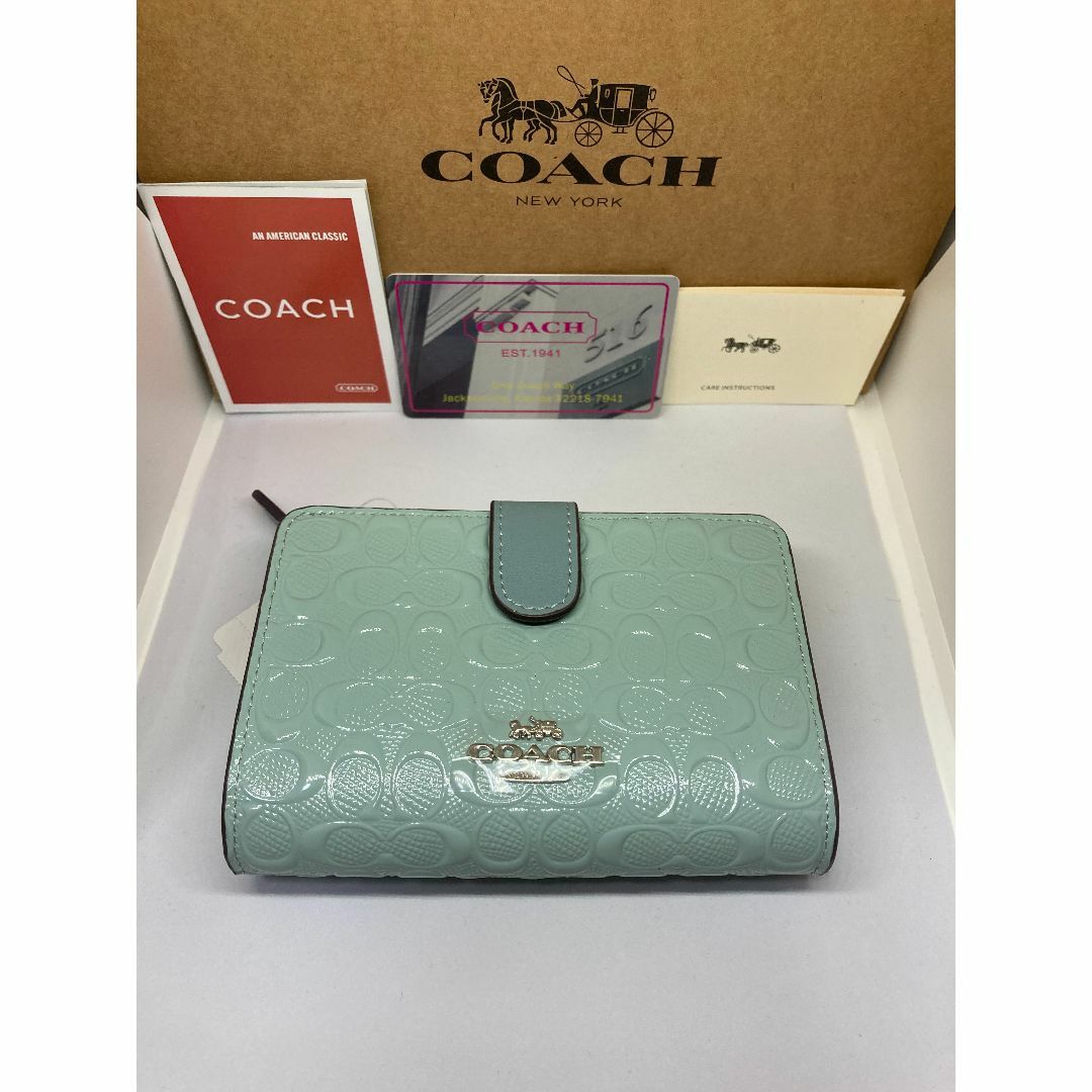 COACH(コーチ)のCOACH　コーチ　F25937　二つ折り財布　デボスド　パテントレザー　ブルー レディースのファッション小物(財布)の商品写真