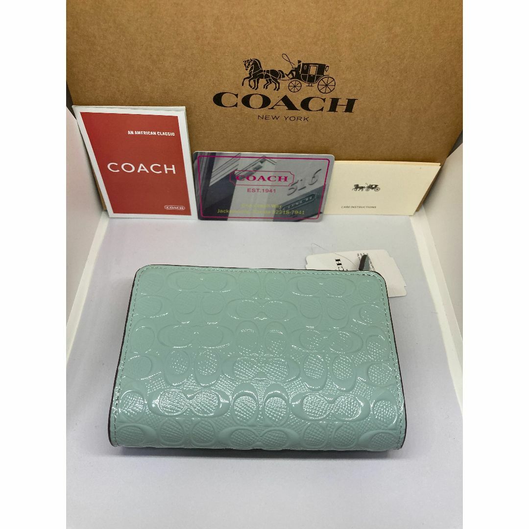 COACH(コーチ)のCOACH　コーチ　F25937　二つ折り財布　デボスド　パテントレザー　ブルー レディースのファッション小物(財布)の商品写真