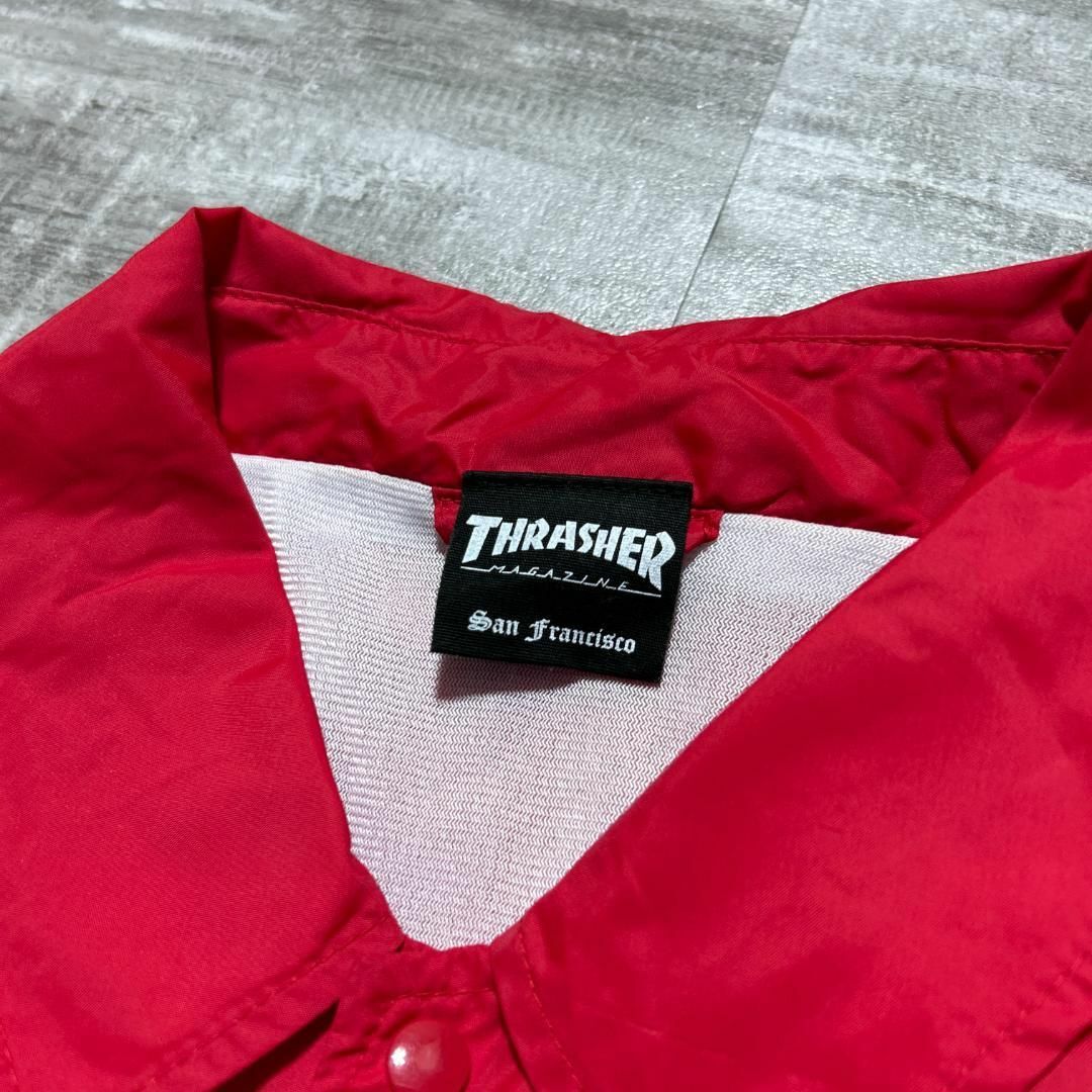 THRASHER(スラッシャー)の美品 THRASHER スラッシャー コーチジャケット キースへリング 赤 L メンズのジャケット/アウター(ナイロンジャケット)の商品写真