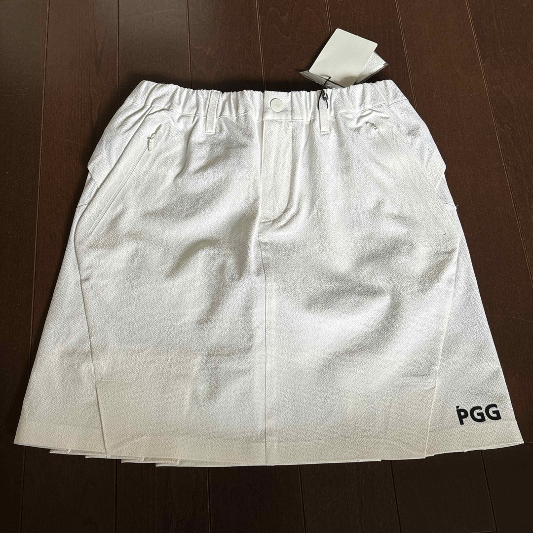 PEARLY GATES(パーリーゲイツ)のパーリーゲイツPGGNyタスランドビーストレッチホワイトスカートサイズ1 レディースのスカート(ミニスカート)の商品写真