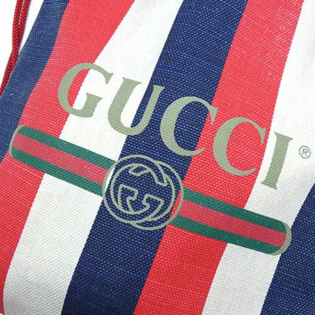 Gucci(グッチ)のグッチ バッグ GUCCI キャンバスxレザー リュック バッグパック ドローストリング レッドxブルー メンズ 473872 T-YJ06256 レディースのバッグ(リュック/バックパック)の商品写真