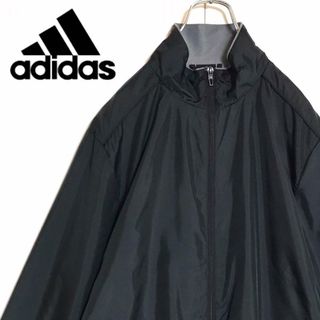 アディダス(adidas)の【人気L】アディダス　袖金ロゴ入りウインドブレーカー　ブラック　C393(ジャージ)