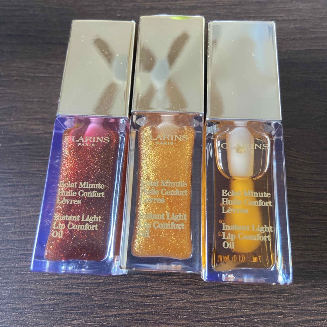 CLARINS(クラランス)の5/3お値下げ☆クラランス　コンフォート　リップオイル　3点 コスメ/美容のベースメイク/化粧品(リップグロス)の商品写真