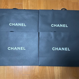 シャネル(CHANEL)のシャネル CHANEL ショッパー ショップ紙袋 ロゴ ブラック 4枚セット(ショップ袋)