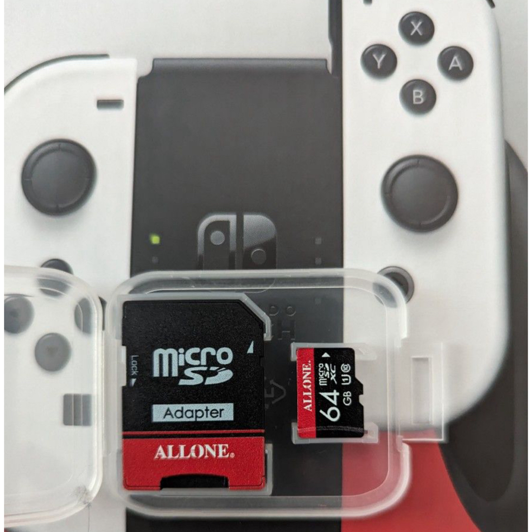 Nintendo Switch(ニンテンドースイッチ)の中古品 スイッチ  任天堂Switch有機ELホワイト   64ギガSDカード エンタメ/ホビーのゲームソフト/ゲーム機本体(家庭用ゲーム機本体)の商品写真