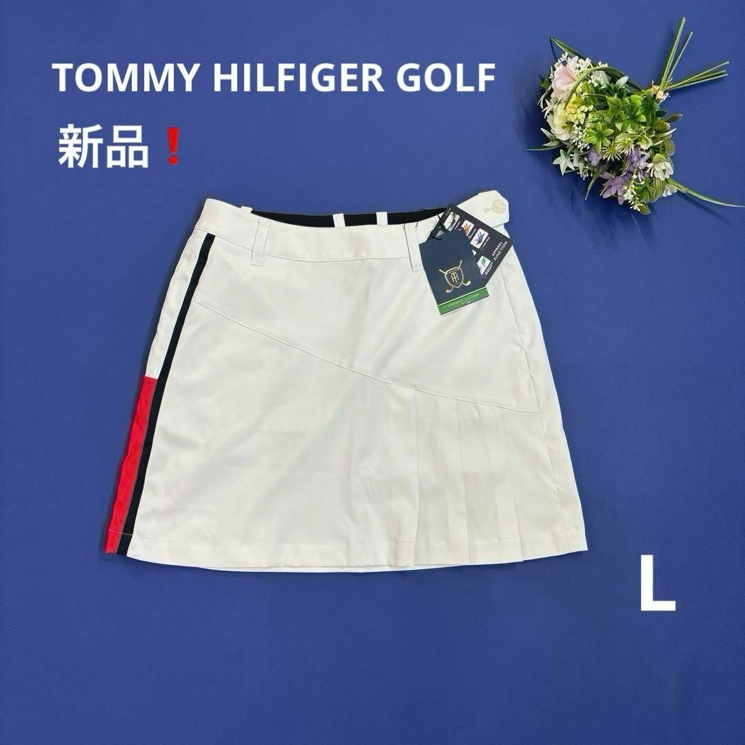 TOMMY HILFIGER(トミーヒルフィガー)の新品❗️トミーヒルフィガーゴルフ　L スカート　フリル　プリーツ　ホワイト スポーツ/アウトドアのゴルフ(ウエア)の商品写真