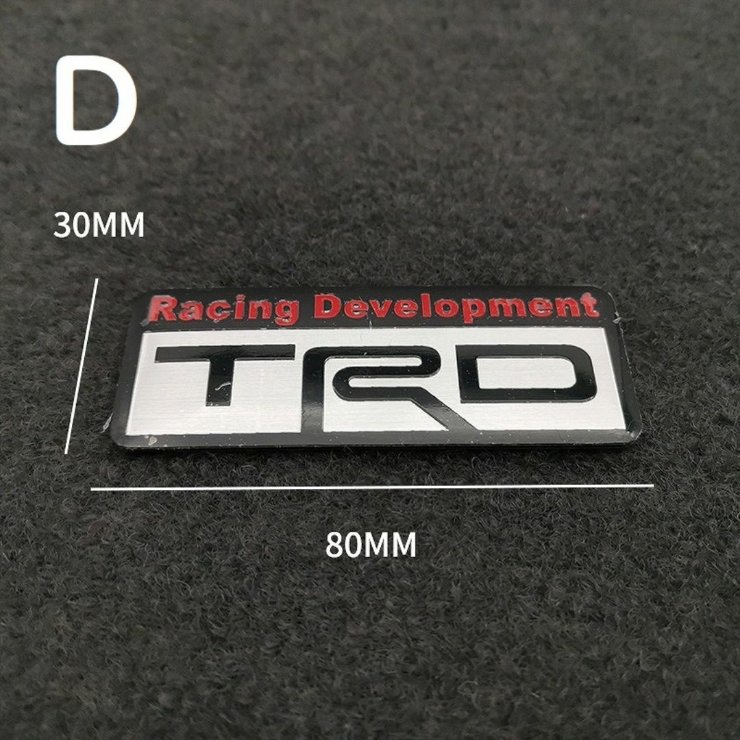 トヨタ【新色：黒/赤】TRD SPORTS アルミ エンブレム ステッカー D 自動車/バイクの自動車(車外アクセサリ)の商品写真