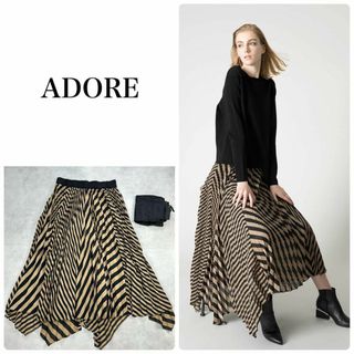 アドーア(ADORE)のADORE アドーア　滝沢真紀子着用　プリーツヘリンボーンフレアースカート　M(ロングスカート)