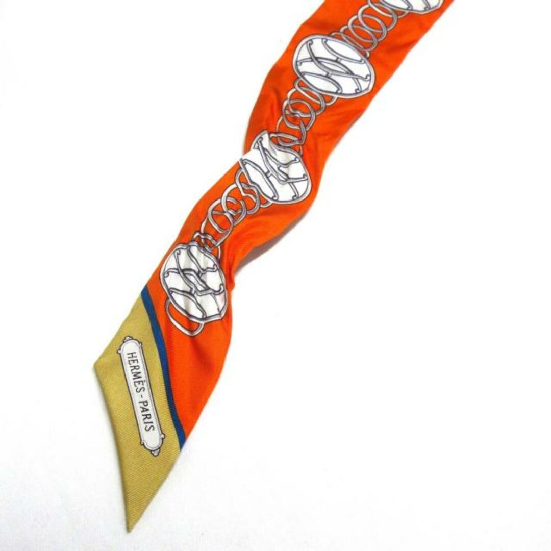 Hermes(エルメス)のHERMES(エルメス) スカーフ ツイリー オレンジ×シルバー×マルチ リボンスカーフ レディースのファッション小物(バンダナ/スカーフ)の商品写真