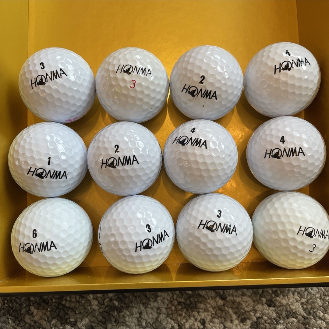 本間ゴルフ(ホンマゴルフ)のHONMA GOLF 本間ゴルフ　ロストボール 白　1ダース12球 スポーツ/アウトドアのゴルフ(その他)の商品写真