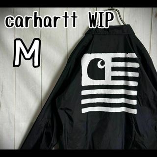 カーハートダブリューアイピー(Charhartt WIP)の【希少デザイン】　カーハートWIP コーチジャケット　フラッグプリント　Ｍ(ナイロンジャケット)