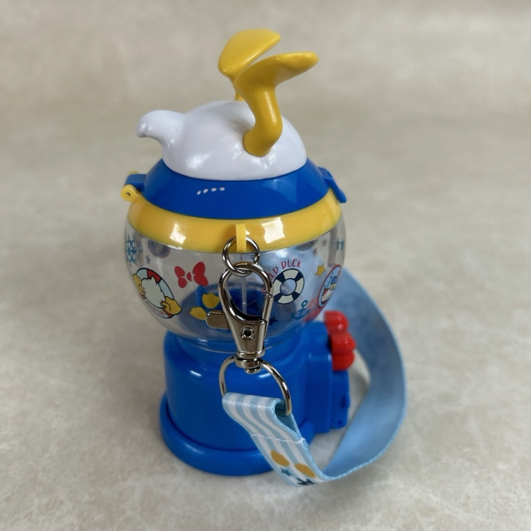 Disney(ディズニー)のディズニー　スーベニア　スナックケース　ドナルド エンタメ/ホビーのおもちゃ/ぬいぐるみ(キャラクターグッズ)の商品写真