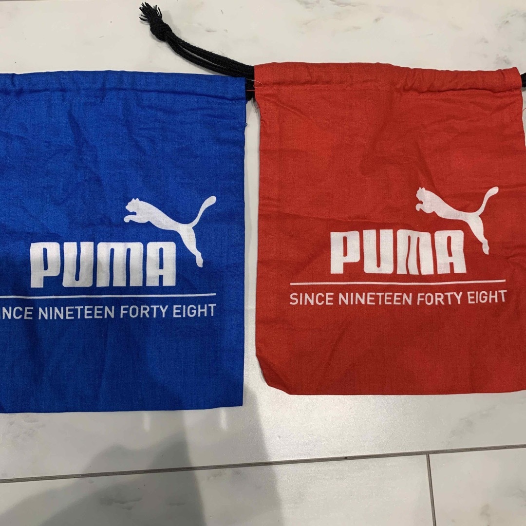 PUMA(プーマ)の新品　プーマ　巾着セット　ブルー　レッド　 その他のその他(その他)の商品写真