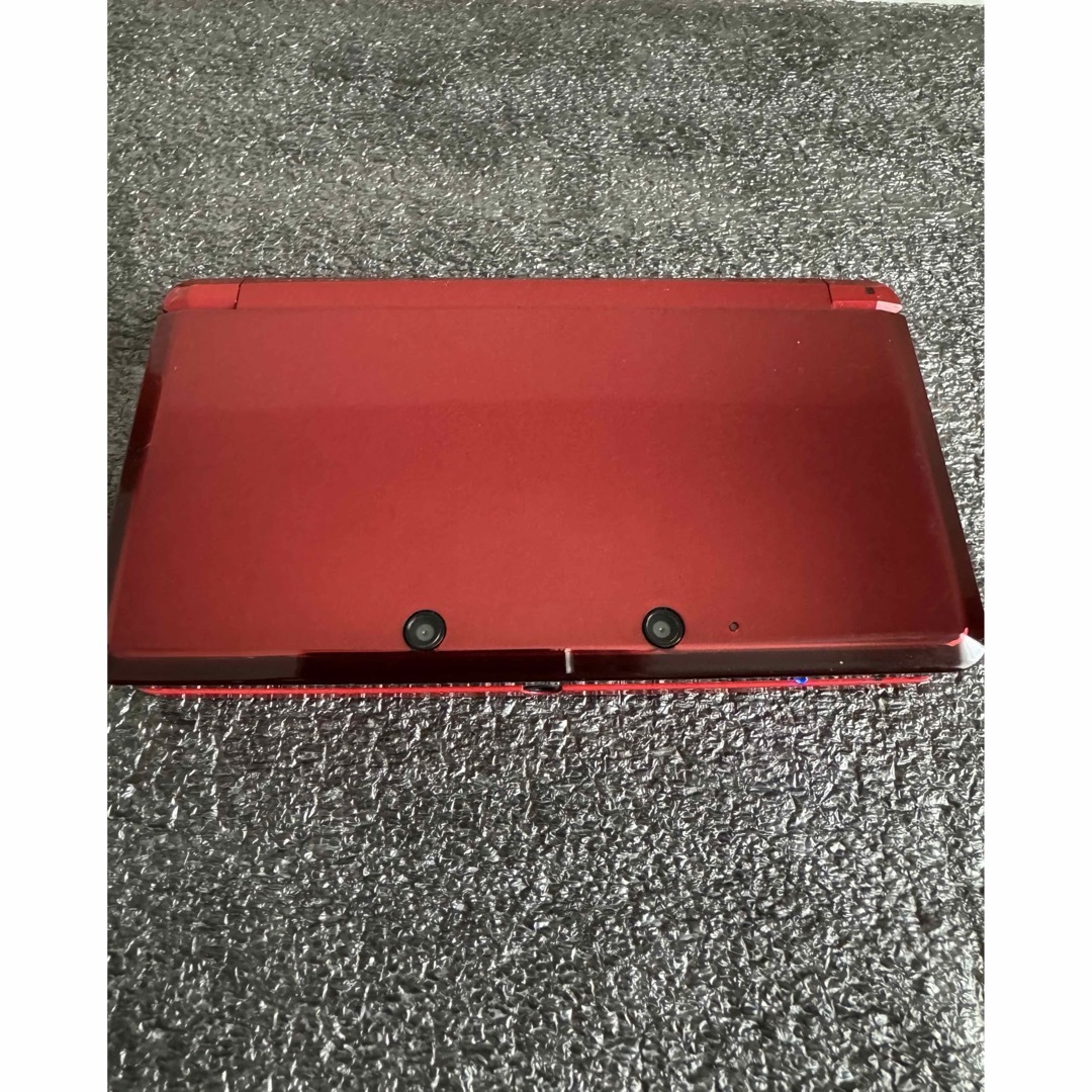 ニンテンドー3DS(ニンテンドー3DS)のNINTENDO 3DS METALLIC RED エンタメ/ホビーのゲームソフト/ゲーム機本体(携帯用ゲーム機本体)の商品写真