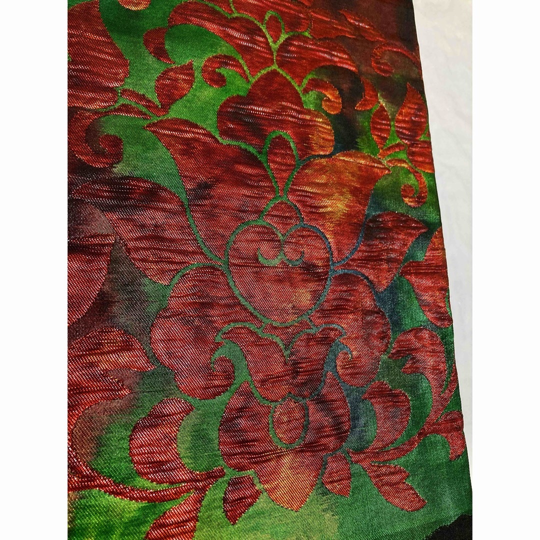 名古屋帯　九寸　黒　緑　オレンジ　唐花紋様　メタリック　膨れ織り　正絹　個性的 レディースの水着/浴衣(帯)の商品写真
