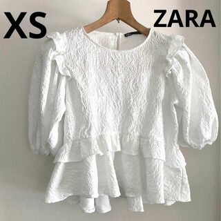 ザラ(ZARA)のZARA ぺプラム　カットソー　トップス　白　ホワイXS(Tシャツ/カットソー(半袖/袖なし))