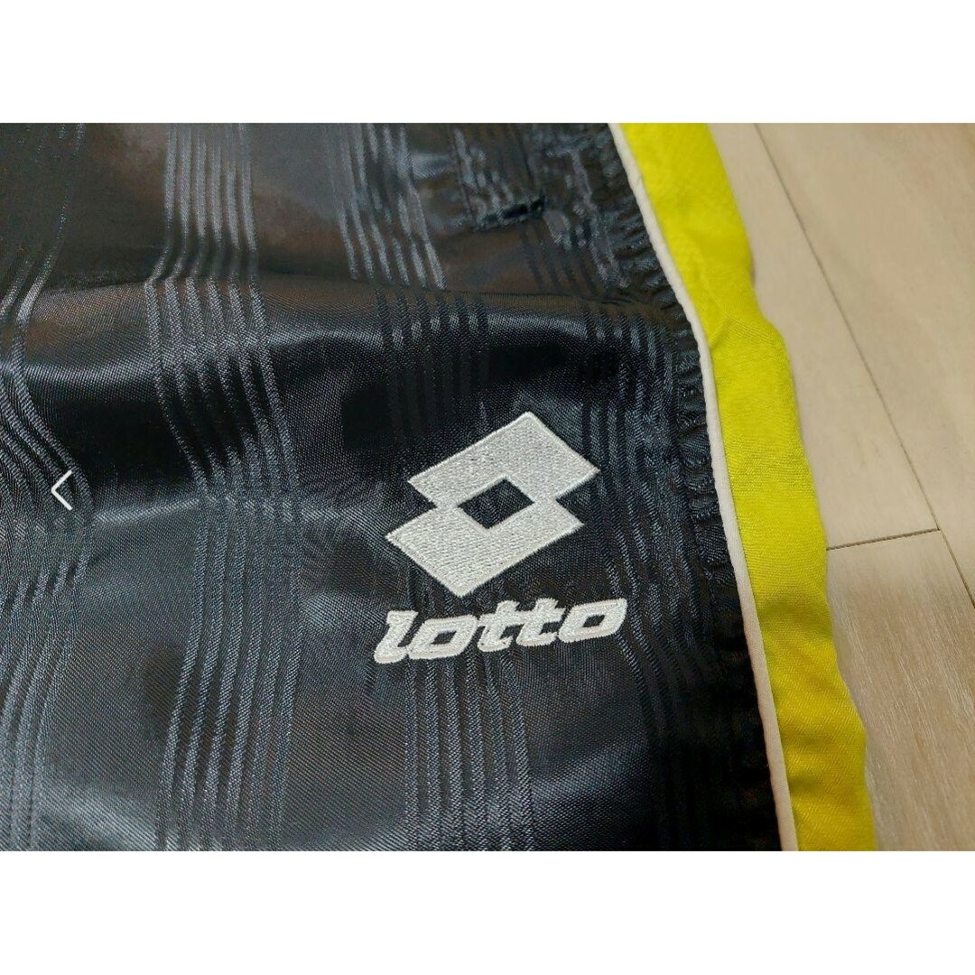 lotto(ロット)のlotto ジャージ パンツ 黒 黄色 ストライプ サッカーフットサル スポーツ/アウトドアのサッカー/フットサル(ウェア)の商品写真