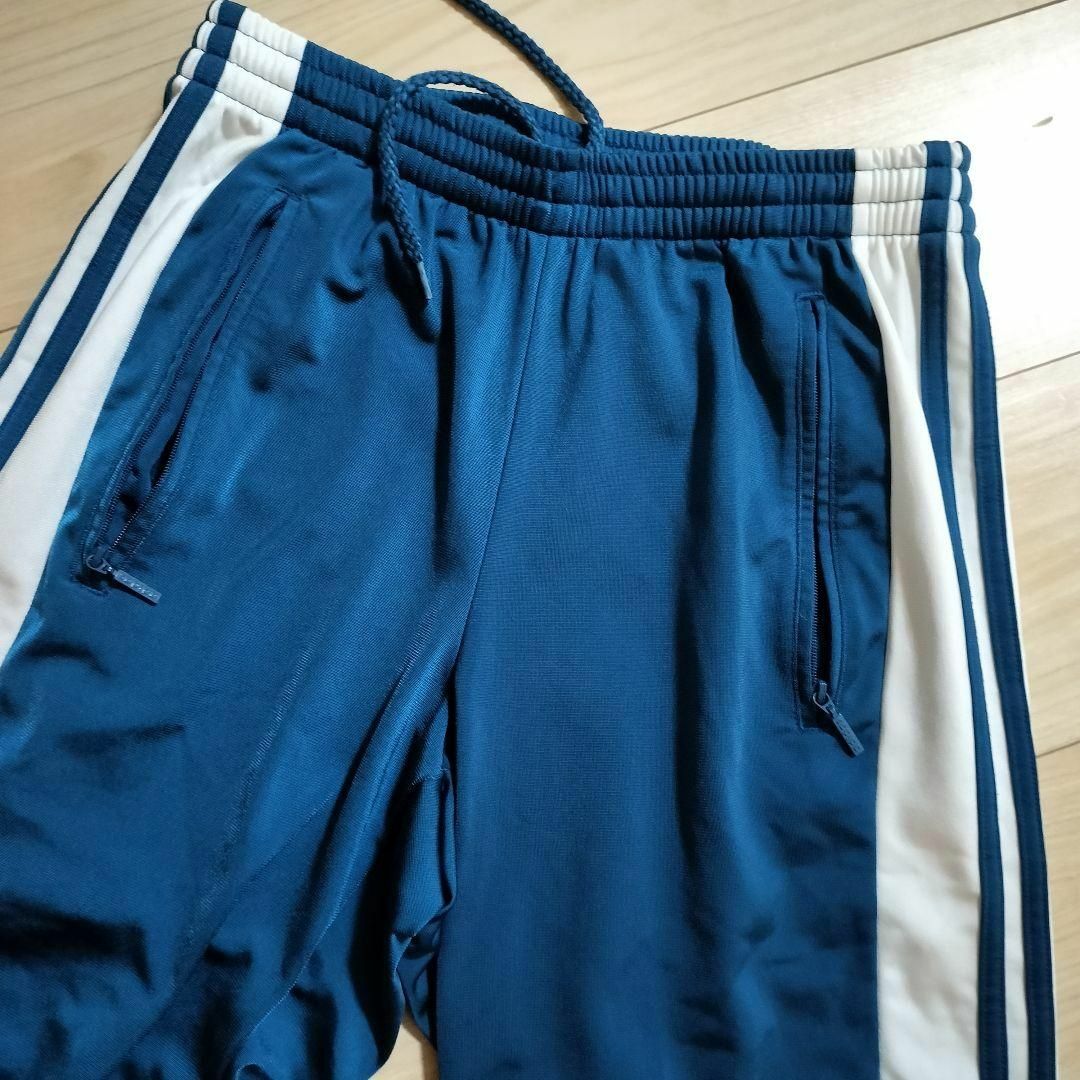 Originals（adidas）(オリジナルス)のアディダス 青紺 OG アディブレイク スナップパンツ ジャージ ユニセックスМ レディースのパンツ(その他)の商品写真