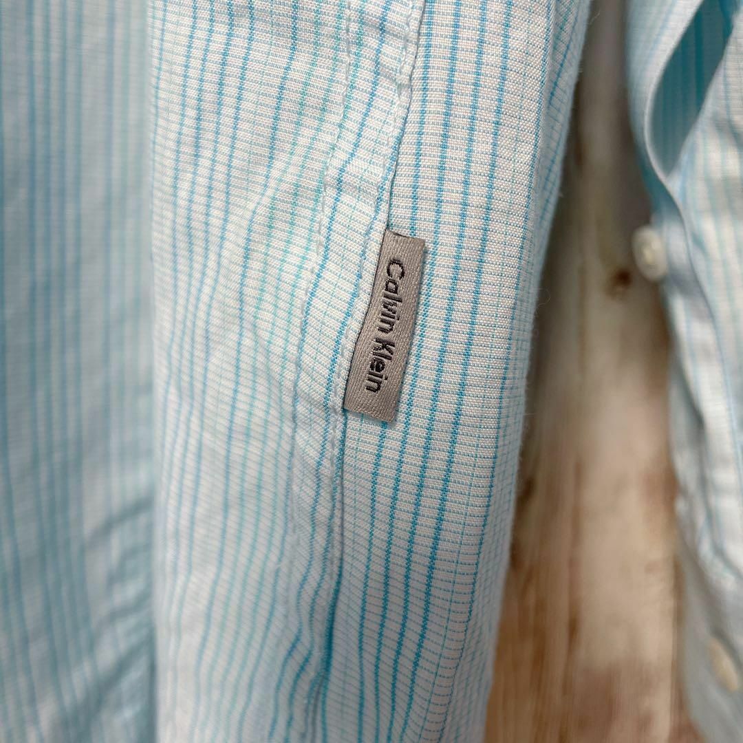 Calvin Klein(カルバンクライン)のＣＫカルバンクライン　ストライプ　チェック模様　青ブルー　長袖シャツ　メンズ古着 メンズのトップス(シャツ)の商品写真