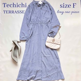 テチチ(Techichi)の◆新品◆テチチテラス◆総柄長袖マキシワンピース◆アイスブルー◆ボウタイ◆F◆水色(ロングワンピース/マキシワンピース)