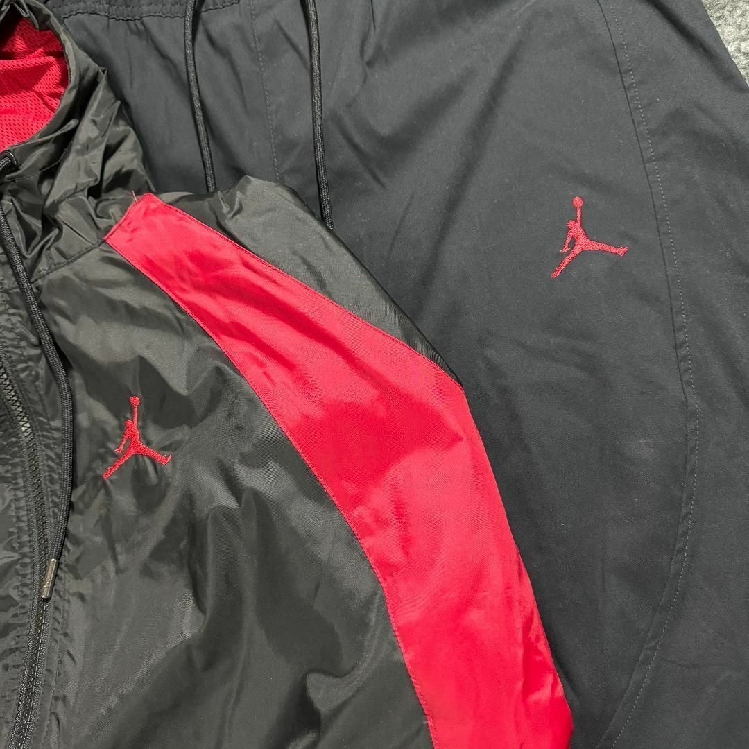 NIKE - 新品 L ナイキ ジョーダン 上下セットアップ 黒 赤 NIKE NIKE - 新品 L ナイキ ジョーダン 上下セットアップ 黒 赤 NIKE