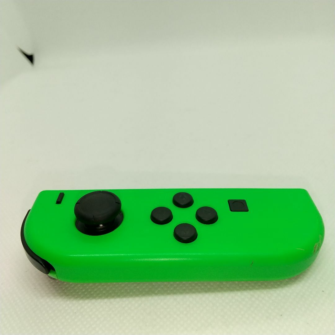 Nintendo Switch(ニンテンドースイッチ)の【大人気】⑨Switch ジョイコン　ネオングリーン左(L)【任天堂純正品】緑 エンタメ/ホビーのゲームソフト/ゲーム機本体(家庭用ゲーム機本体)の商品写真