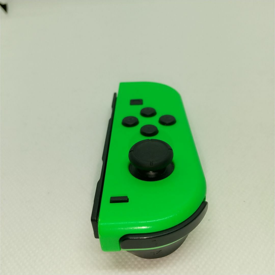 Nintendo Switch(ニンテンドースイッチ)の【大人気】⑨Switch ジョイコン　ネオングリーン左(L)【任天堂純正品】緑 エンタメ/ホビーのゲームソフト/ゲーム機本体(家庭用ゲーム機本体)の商品写真