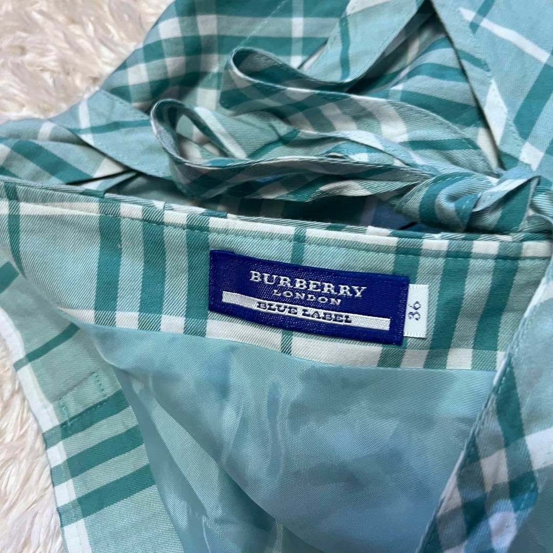 BURBERRY BLUE LABEL(バーバリーブルーレーベル)の【バーバリーブルーレーベル】プリーツギャザーフレアスカート ベルトリボン36水色 レディースのスカート(ミニスカート)の商品写真