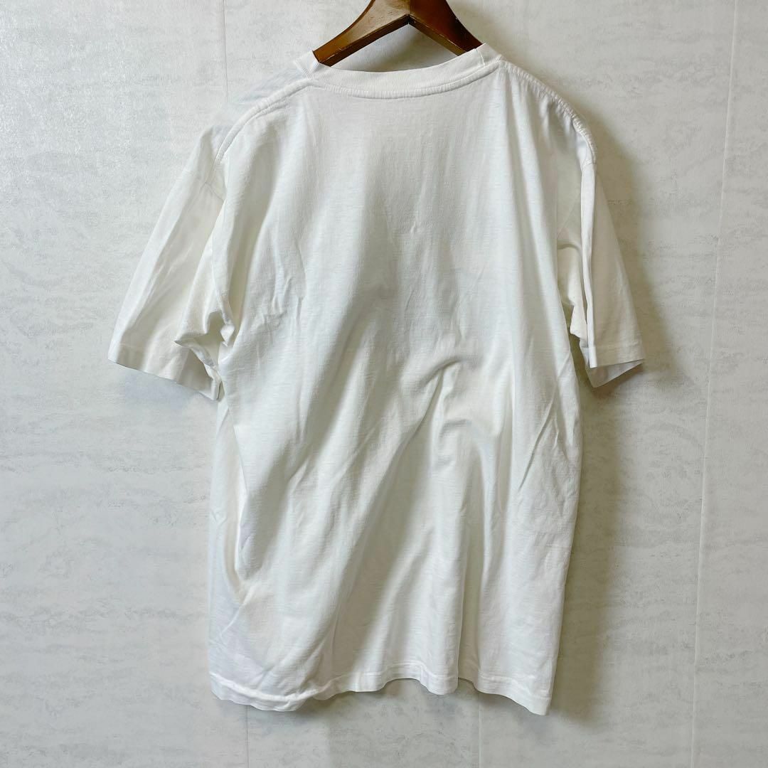 ビンテージ　シングルステッチ　90ＳＴシャツ　白ホワイト　コットンシャツ　古着 メンズのトップス(Tシャツ/カットソー(半袖/袖なし))の商品写真