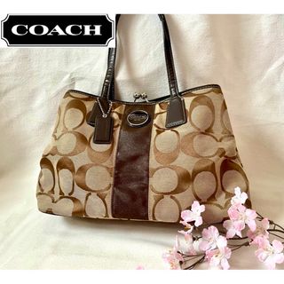 コーチ(COACH)のcoach ブラウン色シグネチャー　キャンバス＆レザー　がま口タイプハンドバッグ(ハンドバッグ)