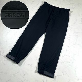 プラダ(PRADA)の【極美品】PRADA プラダ　三角ロゴパッチ　ラバーテープ　ウールイージーパンツ(その他)