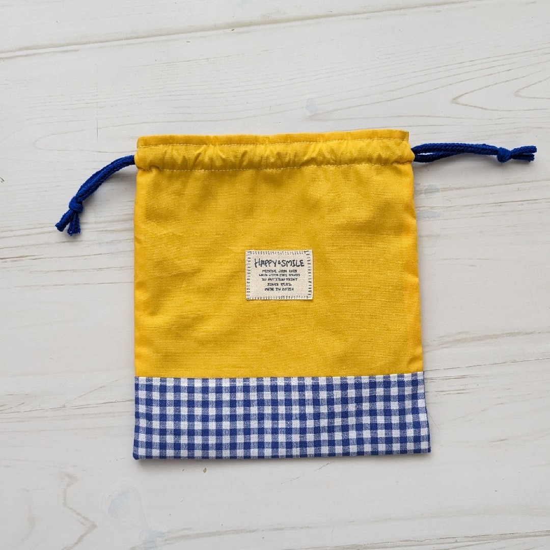 コップ袋　巾着袋　イエロー・ブルー ハンドメイドのキッズ/ベビー(外出用品)の商品写真