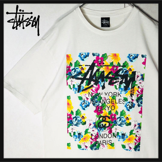 STUSSY - 【人気デザイン】ステューシー ワールドツアー 花柄 半袖 Tシャツ Lサイズ 白