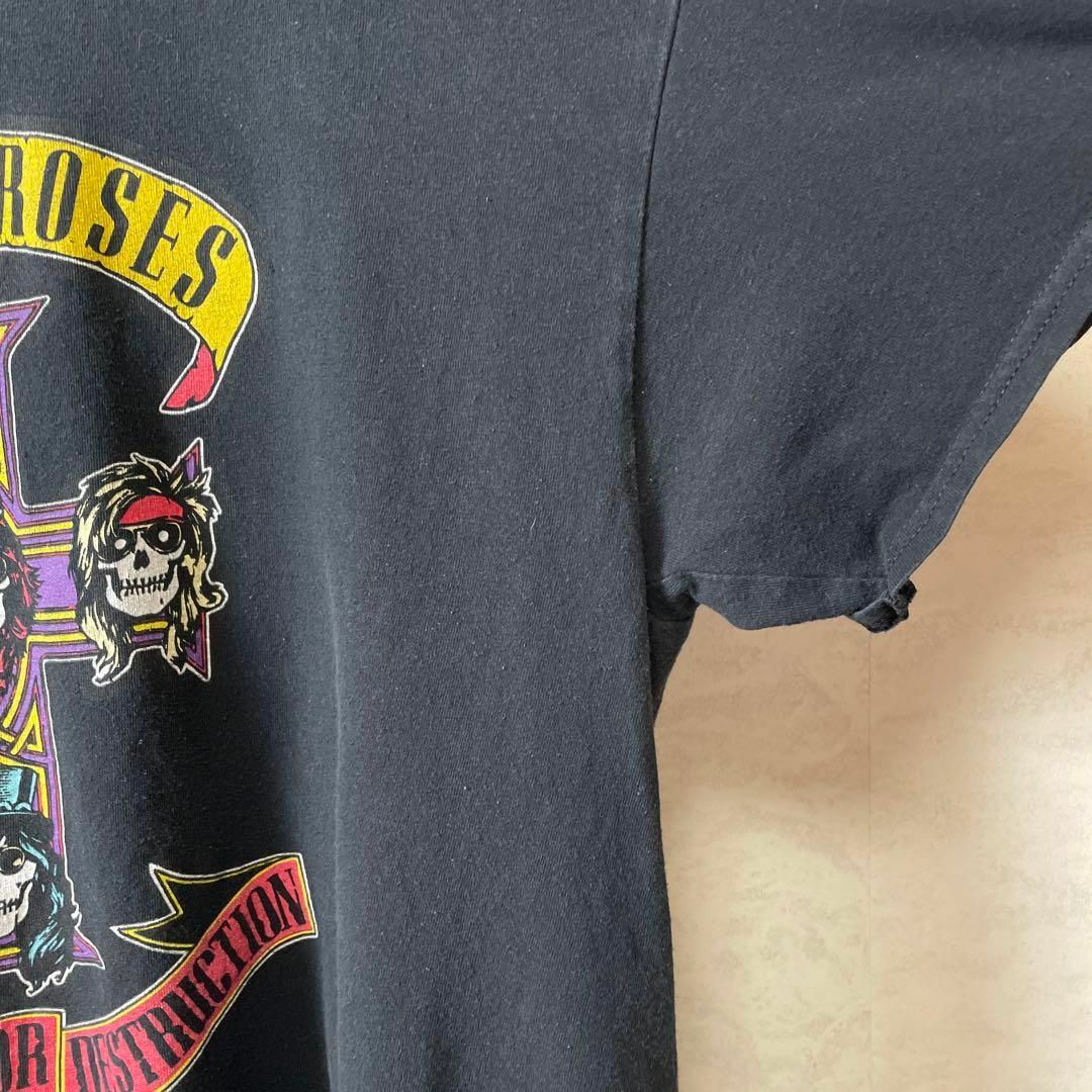 MUSIC TEE(ミュージックティー)のバンドＴシャツ　ガンズ　GUNS　アクセルローズ　初期ロゴ　メンズ　黒　古着 メンズのトップス(Tシャツ/カットソー(半袖/袖なし))の商品写真