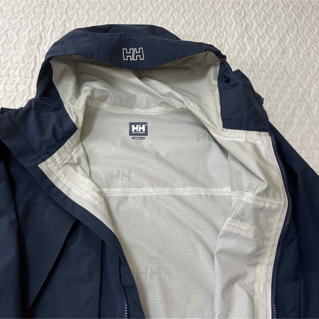 HELLY HANSEN(ヘリーハンセン)のヘリーハンセン　レインウェア　スカンザライトジャケット　ブルー　レディースM レディースのジャケット/アウター(その他)の商品写真