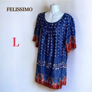 フェリシモ(FELISSIMO)のフェリシモ　エスニック調 パネルプリント チュニック ワンピース　L　半袖　総柄(チュニック)