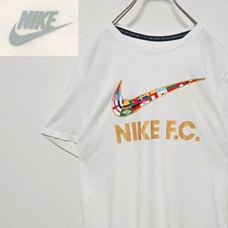 ナイキ(NIKE)のNIKE ナイキ 万国旗 柄 スウッシュ ロゴ ホワイト 半袖 Tシャツ(Tシャツ/カットソー(半袖/袖なし))