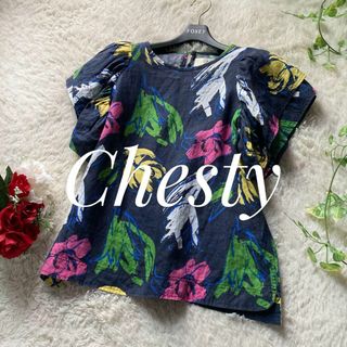 チェスティ(Chesty)のChesty　ピュアリネン　フラワーブラウス　ボリュームスリーブ　パフ　紺　1(シャツ/ブラウス(半袖/袖なし))