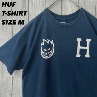 ハフ(HUF)のアメリカ古着HUF ハフ　プリントTシャツ　サイズMネイビー　ユニセックス男女.(Tシャツ/カットソー(半袖/袖なし))