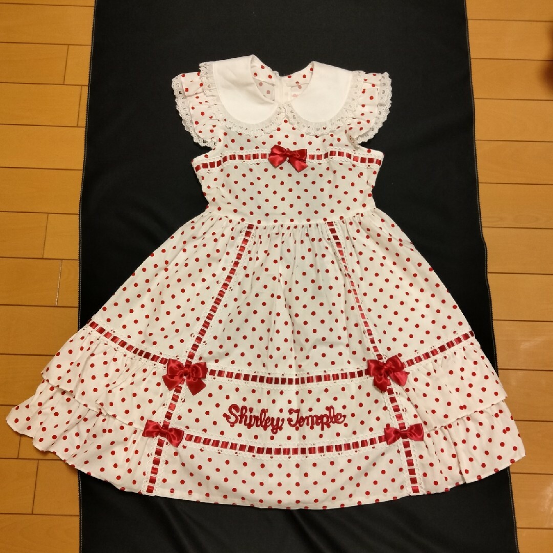 Shirley Temple(シャーリーテンプル)の新品シャーリーテンプル130 阪急限定🎀はしごリボンドットワンピース キッズ/ベビー/マタニティのキッズ服女の子用(90cm~)(ワンピース)の商品写真