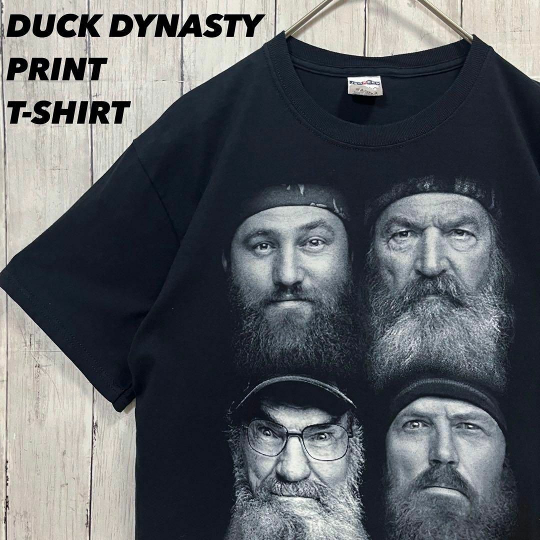 JERZEES(ジャージーズ)の古着　アメリカ人気TVドキュメンタリーDUCK DYNASTYプリントTシャツM メンズのトップス(Tシャツ/カットソー(半袖/袖なし))の商品写真