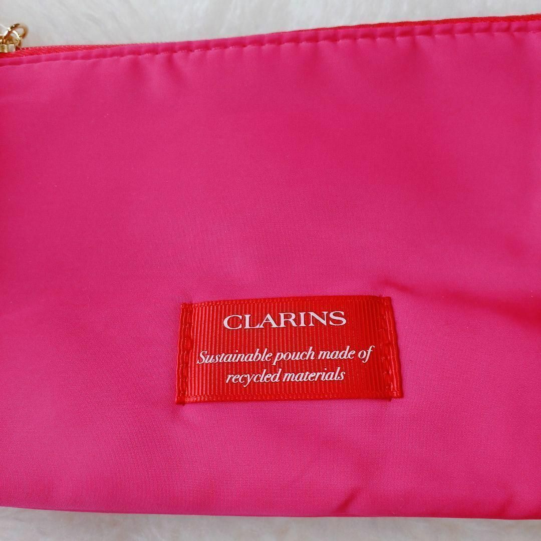 CLARINS(クラランス)の【未使用品❤️】CLARINSクラランス　クリスマスコフレポーチ　ピンク リボン レディースのファッション小物(ポーチ)の商品写真