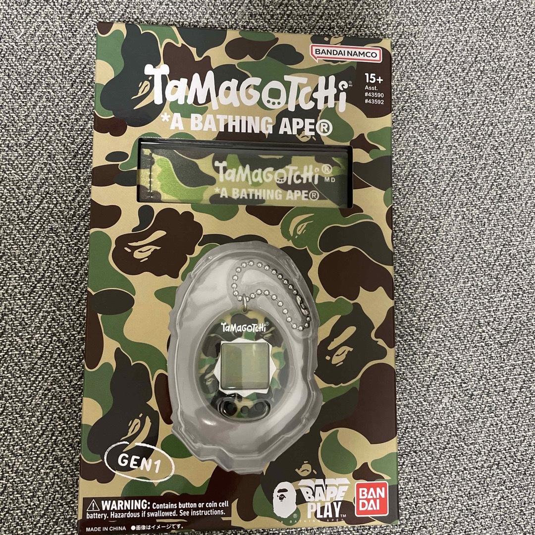 A BATHING APE(アベイシングエイプ)の【新品・未使用】A BATHING APE x TAMAGOTCHI グリーン エンタメ/ホビーのおもちゃ/ぬいぐるみ(その他)の商品写真