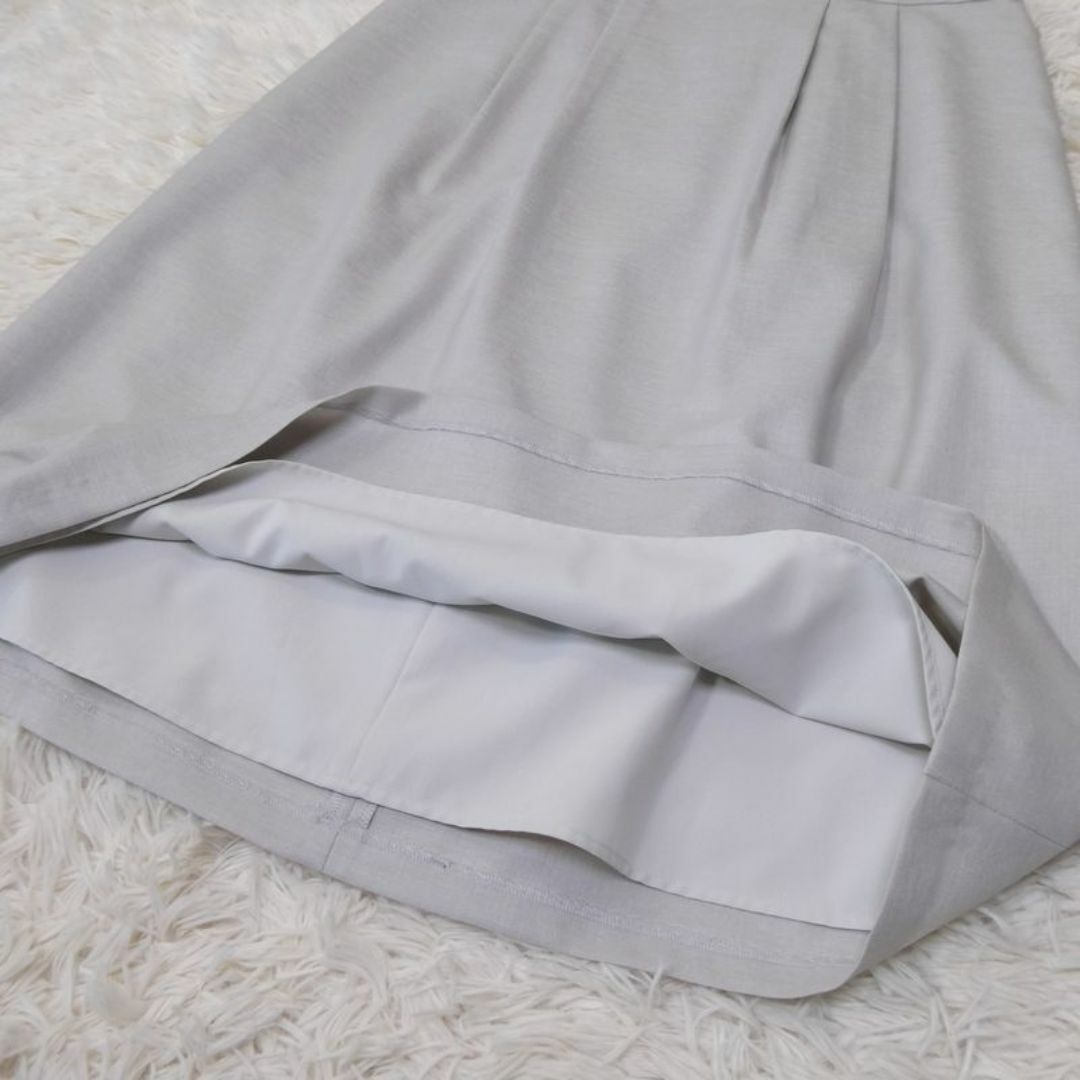 ReFLEcT(リフレクト)のReflect レディース スカート ひざ丈 タックスカート M レディースのスカート(ひざ丈スカート)の商品写真