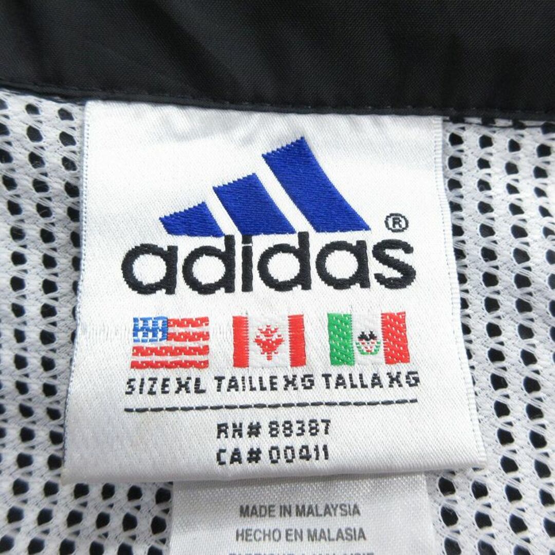 adidas(アディダス)のXL★古着 アディダス adidas 長袖 ナイロン ジャケット メンズ 90年代 90s ワンポイントロゴ 大きいサイズ ラグラン 黒他 ブラック 3本ライン 24apr25 中古 アウター ウインドブレーカー メンズのジャケット/アウター(ダッフルコート)の商品写真