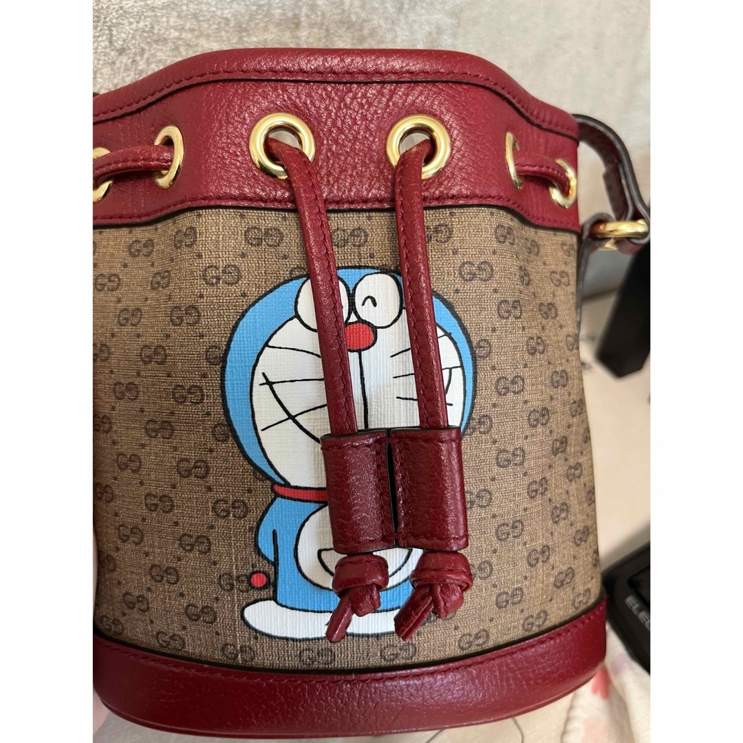 Gucci(グッチ)の【新品同様】GUCCI グッチ　バッグ　ドラえもん レディースのバッグ(ショルダーバッグ)の商品写真